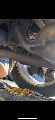 The Vice grip from Cassidy's still attached to my car as it is being towed due to unauthorized and low quality work