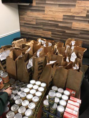 A few bags that needed more items before being completed , as part of the 225 Thanksgiving meals we will be passing out tomorrow.