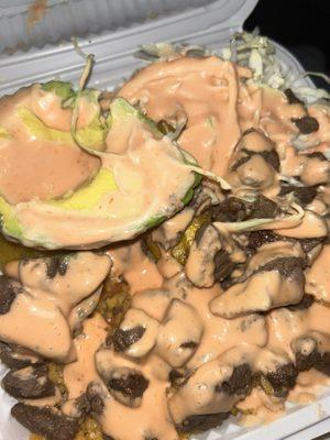 Carne frita, moro, ensalada, aguacate, chimi sauce (ask for bottle at counter!)