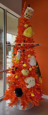 Tree with plushie ornaments