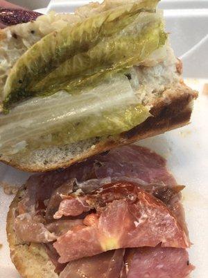 Jkron exposed... hardly any meat, wilted lettuce, old mushy tomato.