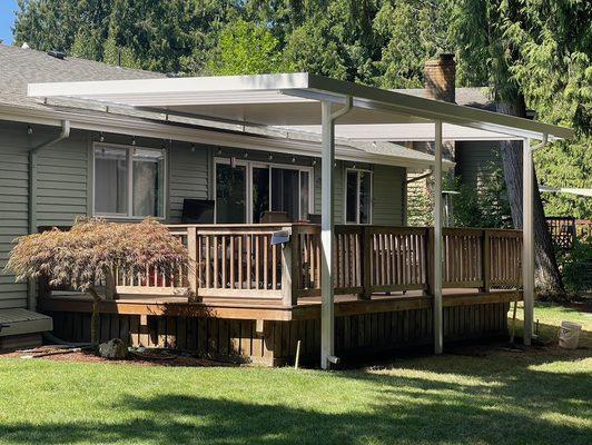 Durable, low-maintenance aluminum patio cover added to expand usable outdoor space year-round.