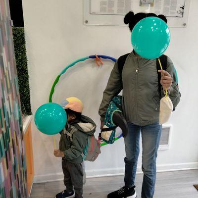 They were a fan of getting a balloon. This photo is not edited to cover their faces lol.