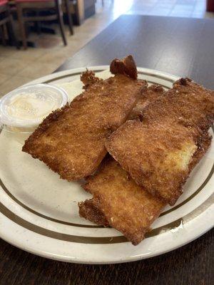Fried tamales. No filling - just fried masa. With mayonnaise and a slab of cheese.