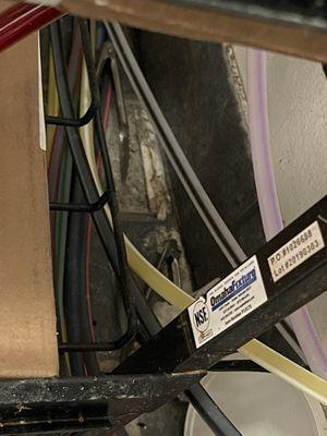 Look at those two tongs laying on the floor behind the soda boxes and how nasty the floor is.