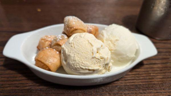 Fried bananas with coconut and vanilla ice cream