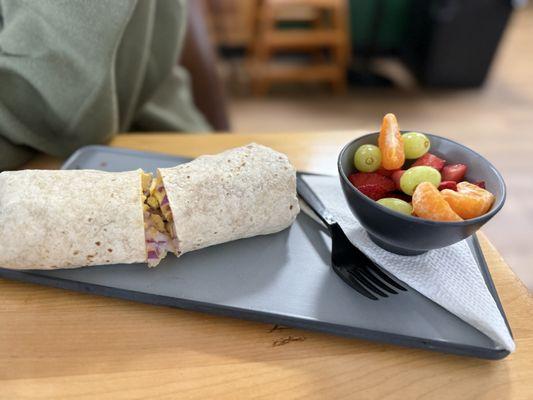 Veggie burrito with fruit.