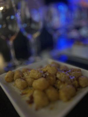 Tater tots with cheese and microscopic bacon