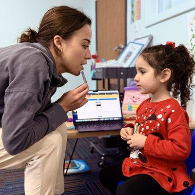 Savannah working with patient in speech session.