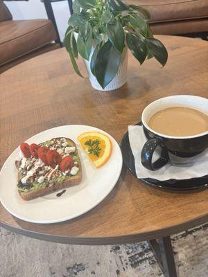 Deluxe avocado toast and an americano