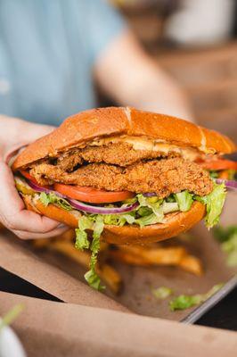 Fried Catfish Po'Boy - tartar, lettuce, tomato, pickles, onion