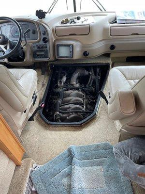 Accessing the serpentine belt. I learned how to do it so I won't get stranded next time.