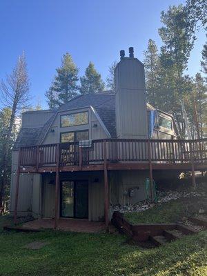 Before - old T1-11 siding.