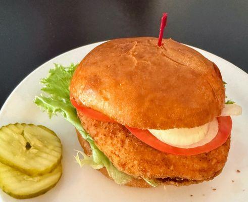 10.13.25 breaded chicken with lettuce and onion on brioche roll and pickles on the side $11.99