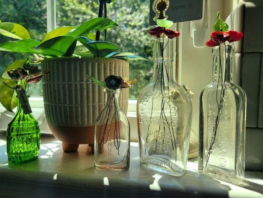 Whitehurst, 2 McCormick, & Listerene Lambert (no photo) my custom vintage glass flowers and poppies. (emerald glass bottle purchased sep.)