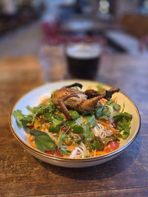 Grilled Quail over rice noodles special.