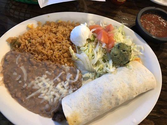 Steak burrito with rice and beans