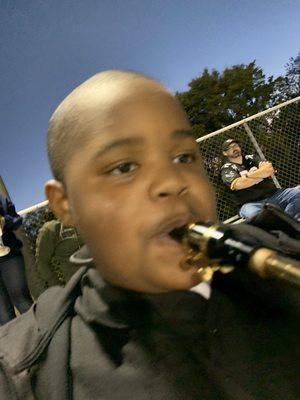 Sexy Black Man playing Instrument