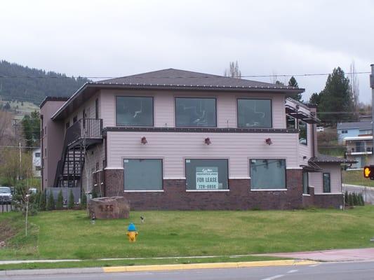 Located on the corner of SW Higgins and High Park. Massgae Envy is downstairs, we are upstairs.