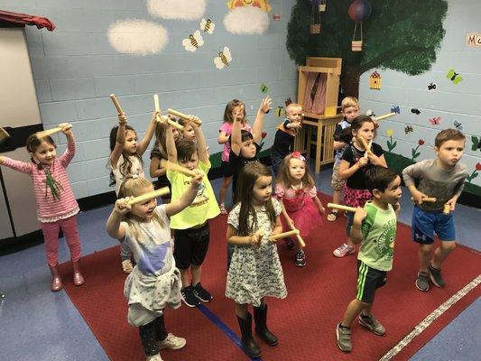 Music and movement with rhythm sticks