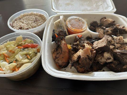 Ya Man Combo - Jerk pork, jerk chicken (dark), rice and peas, and cabbage/veggie mix.