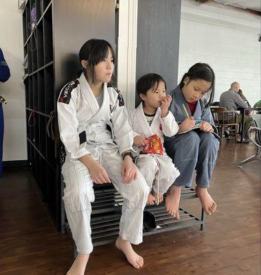 Chilling and snacking before class begins.