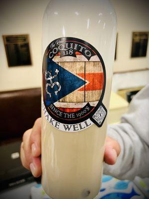 Coquito- Homemade Puerto Rican eggnog by club member Victor. It's a rich, creamy coconut rum drink flavored with spices.