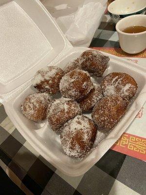 Hot fresh to go donuts.