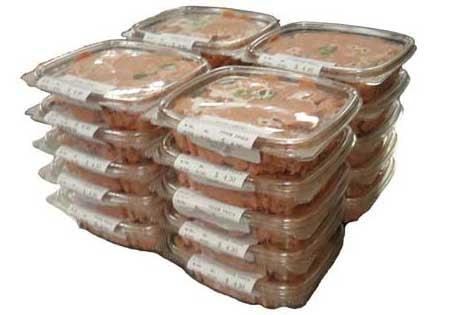 Our meals are packaged fresh in deli containers. Based on the weight of your dog is how you determine container size.