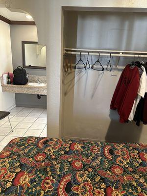 The bed, which does not match the photos on Booking.com