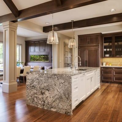 Top off your design with beautiful quartz or granite counter tops. Wide selection of colors and design options.