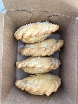 Samosas filled with potatoes and yellow curry. Very delicious.