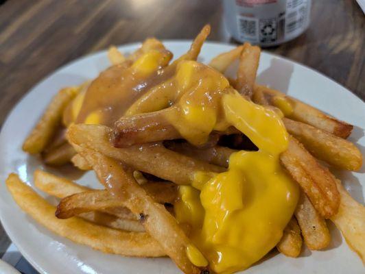 Fries with gravy and cheese