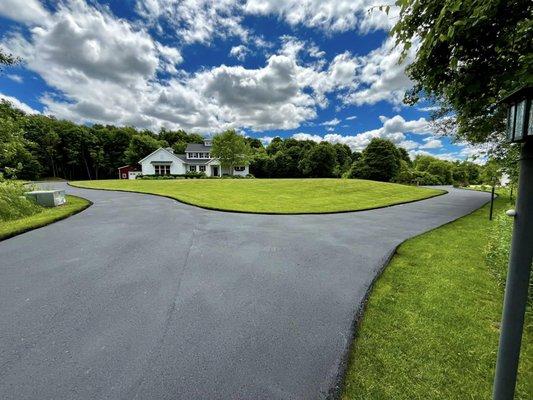 Crack Sealing and Sealcoating after Pothole repair in Sparta, MI
