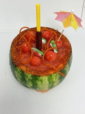 Pica fresa in a watermelon