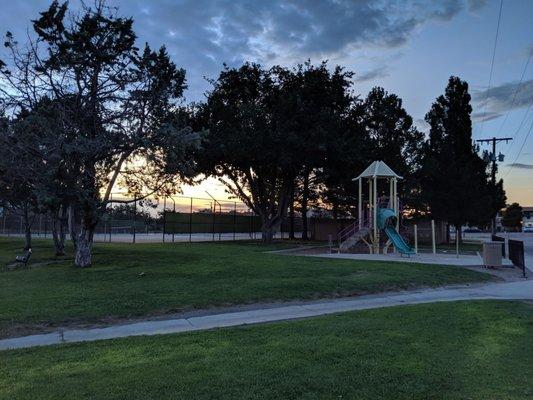 Playground with the tennis courts in the background.