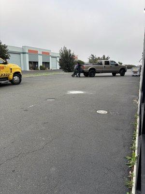 Chris Engine employees going out of their way to help tow driver load a non-op vehicle