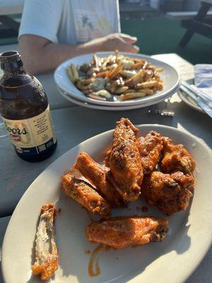 Buffalo wings and poutine