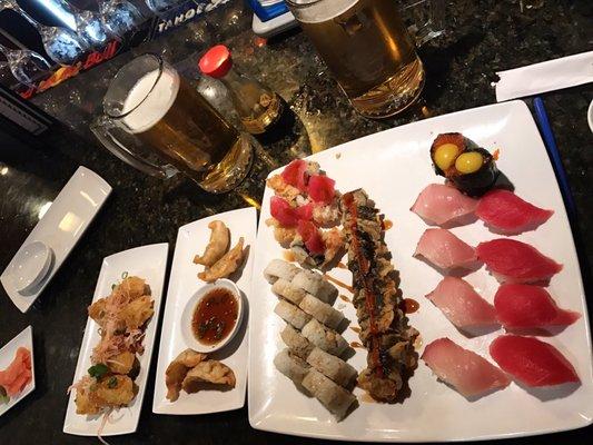 This is the tray we didn't order, but was given. Fried roll was super dry. Really liked the calamari.