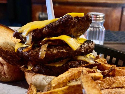 Between the three dollar pitchers and the pile of meat in the Gallybuster. You won't leave here unsatisfied like she does!