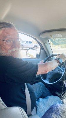 Happy Ross test driving his new ride.