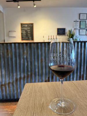 Serving bar and a glass of cab sauv