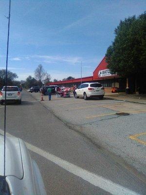 Passing out "Brain Food" packets for schooling from home