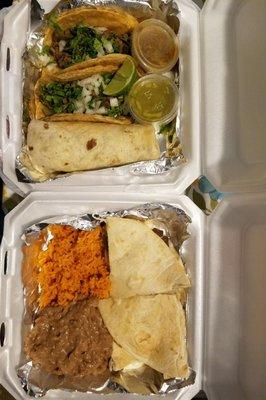 Steak tacos with cilantro & onion. Bean, rice and cheese burrito. Combo #2 - steak.