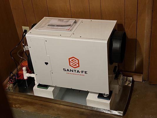 This is a smaller capacity commercial grade dehumidifier installation to solve basement moisture issues.