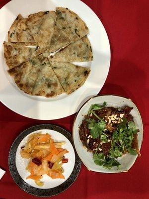 Scallion Pancake, Sliced Beef & Maw Szechuan Style, and complimentary Marinated Pickles.