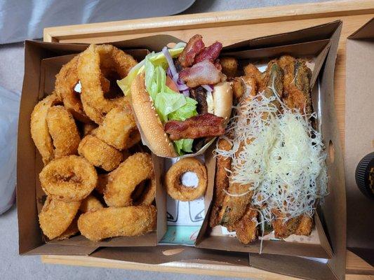 Onion rings, blue cheese bacon burger, and fried zucchini (parmesan? on top). IG: @kurtissandyeats for more food photos :)
