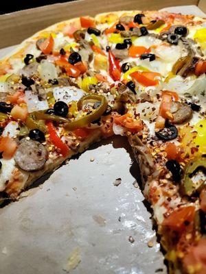 9-25-24 the 16" veggie with sausage pizza. It looked so good I had to try a slice right away. It was very good.