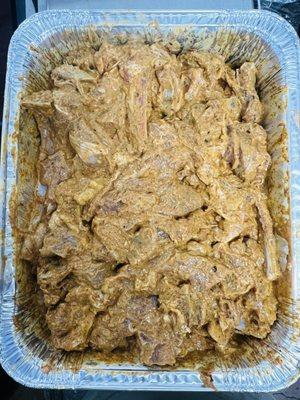 Marinated goat meat.