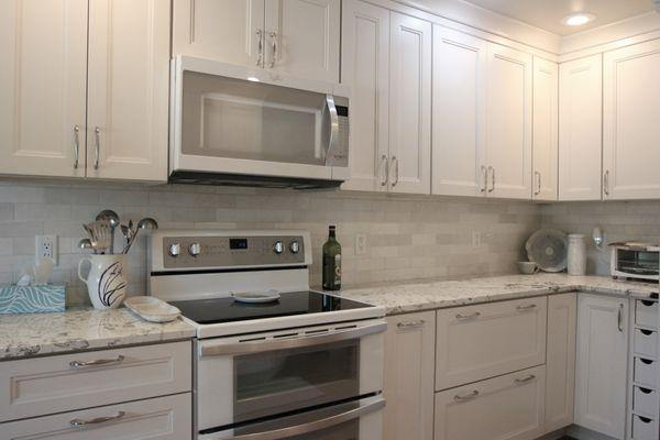 Client purchased cabinets, countertops, and tile for wall splash.